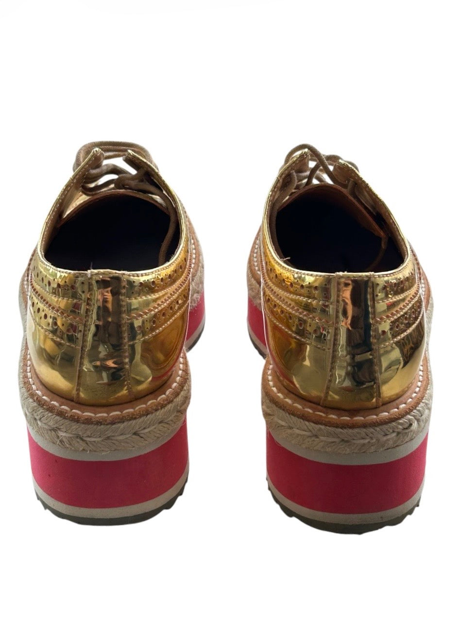 Gold Prada Loafers