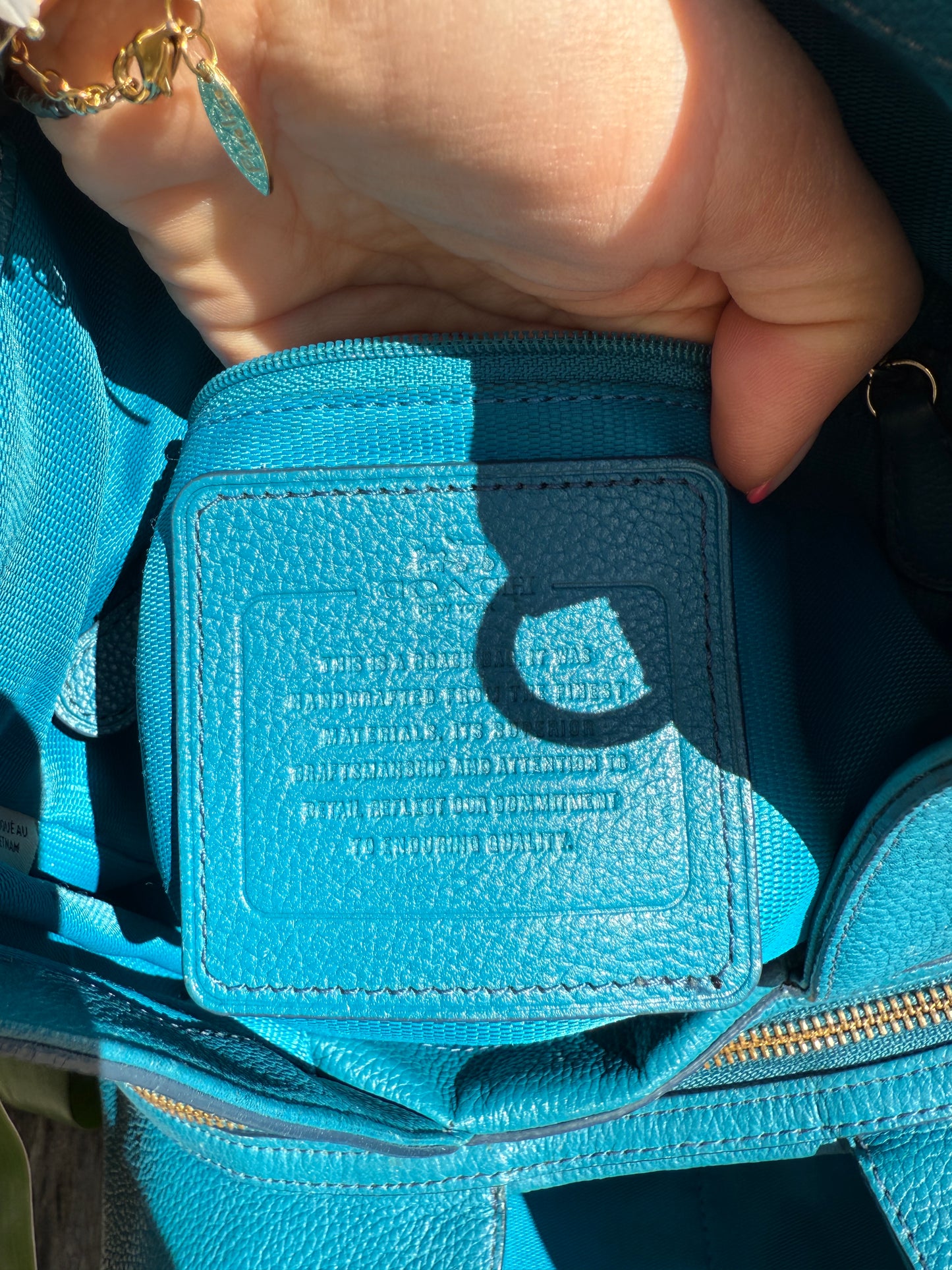 Turquoise Coach